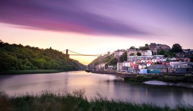 The Clifton Suspension Bridge is a world famous suspension bridge spanning the Avon Gorge and the River Avon, linking Clifton in Bristol to Leigh Woods in North Somerset. clipart