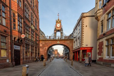 Eastgate Clock on the city wall in Eastgate Street in the city of Chester, England. clipart