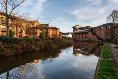 A view over the Shropshire Union canal showing a typical canal barge, Chester, England. clipart