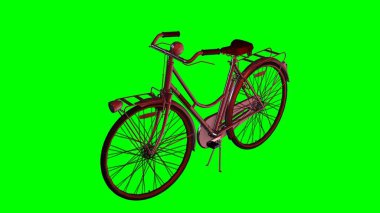 Yeşil bir arka plan önünde eski bisiklet