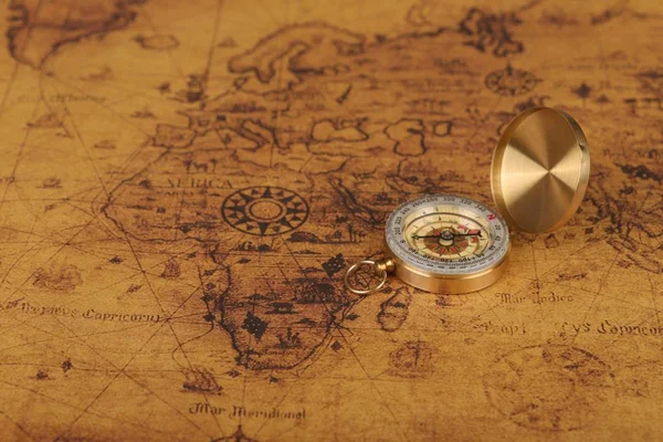 vintage compass on old map - Explore the world-travel concept