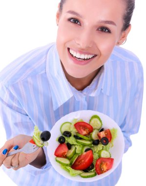 Sağlıklı yemek yiyen güzel bir kız. Güzel kız.