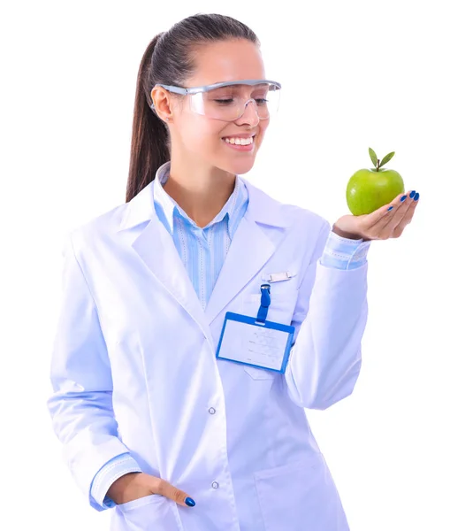 Mulher sorridente doutor com uma maçã verde. Mulher médica — Fotografia de Stock