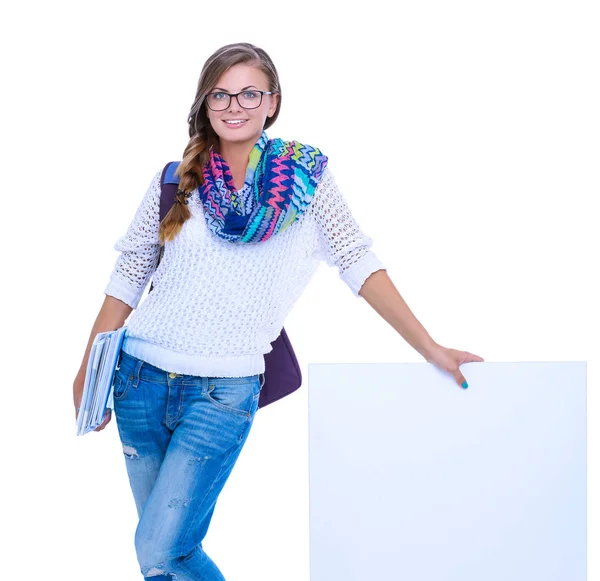 Hermosa estudiante señalando en el tablero en blanco. Estudiante . — Foto de Stock