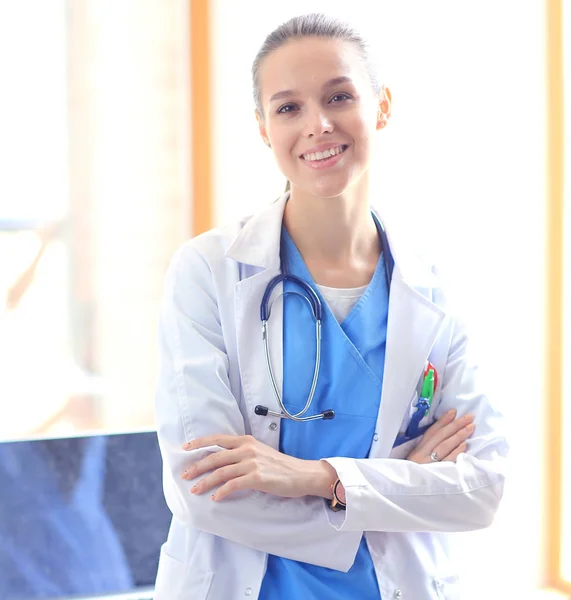 Woman doctor standing near window at hospital. Woman doctor — Stock Photo, Image