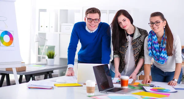 Young business people working at office on new project — Stock Photo, Image