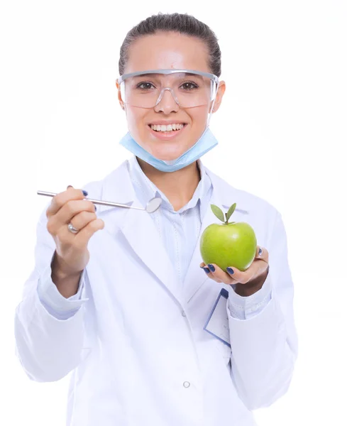 Dentist medical doctor woman hold green fresh apple in hand and tooth brush. Dentist doctors. Woman doctors — Stock Photo, Image