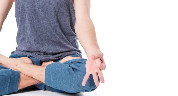 Adult man with naked torso doing exercise on white background — Stock Photo, Image