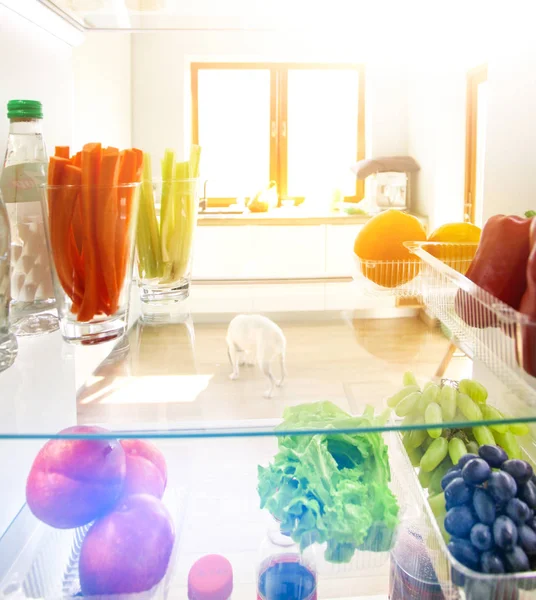 Open refrigerator with fresh fruits and vegetable. Open refrigerator — Stock Photo, Image