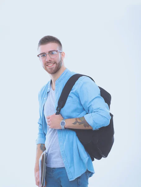 Un estudiante masculino con una bolsa de la escuela sosteniendo libros aislados sobre fondo blanco. Oportunidades educativas. Estudiante universitario . —  Fotos de Stock