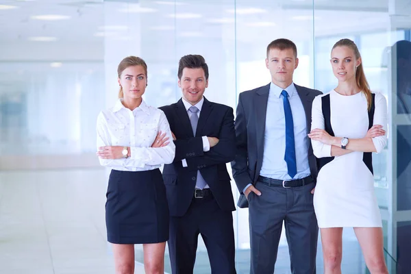 Happy business team showing thumbs up in office. Happy business team — Stock Photo, Image