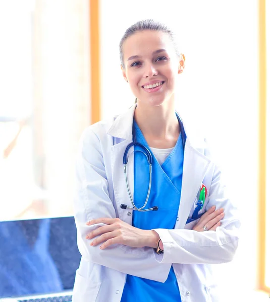 Woman doctor standing near window at hospital. Woman doctor — Stock Photo, Image