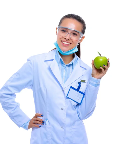 Dentist medical doctor woman hold green fresh apple in hand and tooth brush. Dentist doctors. Woman doctors — Stock Photo, Image