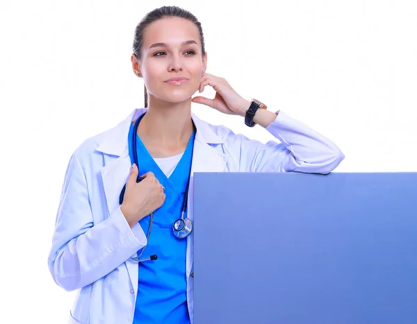 A female doctor with a blank billboard. Woman doctor — Stock Photo, Image