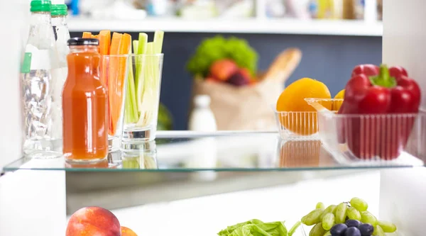 Open refrigerator with fresh fruits and vegetable. Open refrigerator — Stock Photo, Image