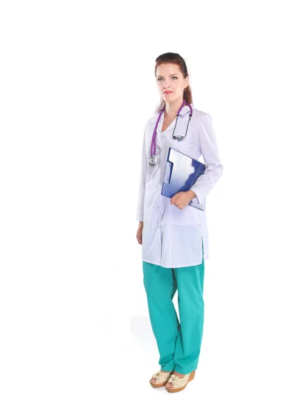 Smiling female doctor with a folder in uniform standing at hospital. Smiling female doctor — Stock Photo, Image