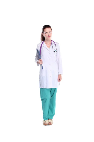 Smiling female doctor with a folder in uniform standing at hospital. Smiling female doctor — Stock Photo, Image