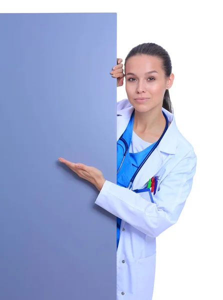 A female doctor with a blank billboard. Woman doctor — Stock Photo, Image