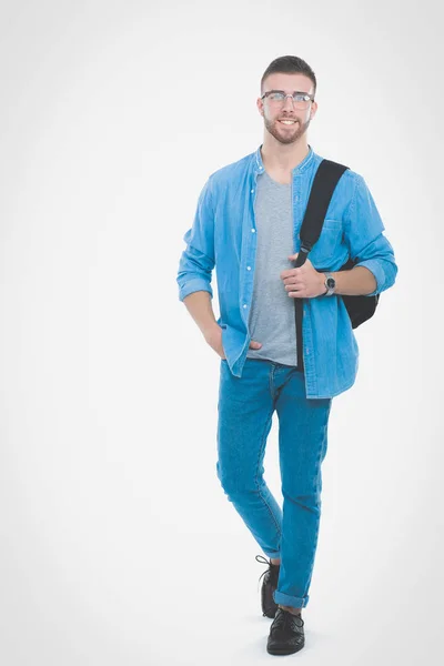 Un estudiante masculino con una bolsa de la escuela sosteniendo libros aislados sobre fondo blanco. Oportunidades educativas. Estudiante universitario . — Foto de Stock