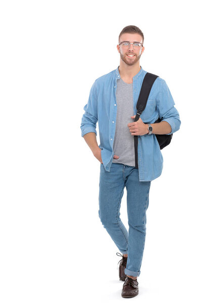 Ученик со школьной сумкой, держащий книги на белом фоне. Образовательные возможности. Студент
.