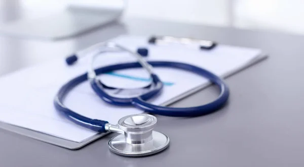 Medical equipment: blue stethoscope and tablet on white background. Medical equipment — Stock Photo, Image