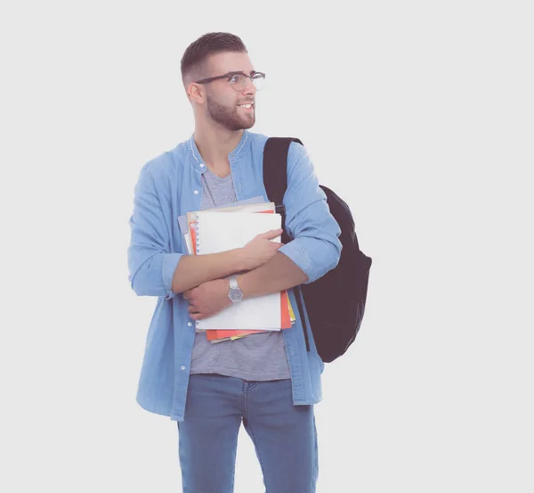 Un estudiante masculino con una bolsa de la escuela sosteniendo libros aislados sobre fondo blanco. Oportunidades educativas. Estudiante universitario . — Foto de Stock