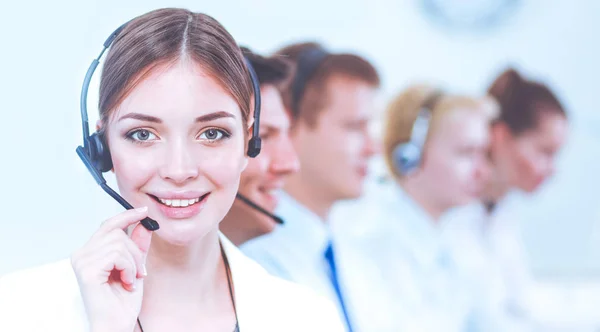 Attractive Smiling positive young businesspeople and colleagues in a call center office — Stock Photo, Image