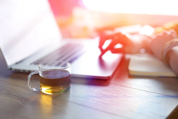 Young woman holding credit card and using laptop computer. Online shopping concept — Stock Photo, Image