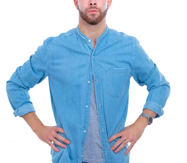 Portrait of a happy casual man standing isolated on a dark background — Stock Photo, Image