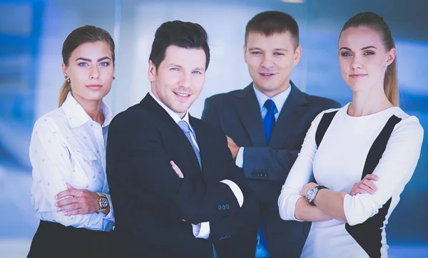 Smiling successful business team standing in office — Stock Photo, Image