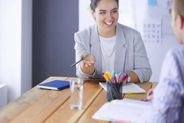 Young people studying with books on desk. Beautiful women and men working together. — Stock Photo, Image