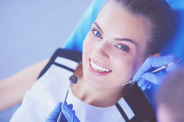 Young Female patient with pretty smile examining dental inspection at dentist office. — Stock Photo, Image