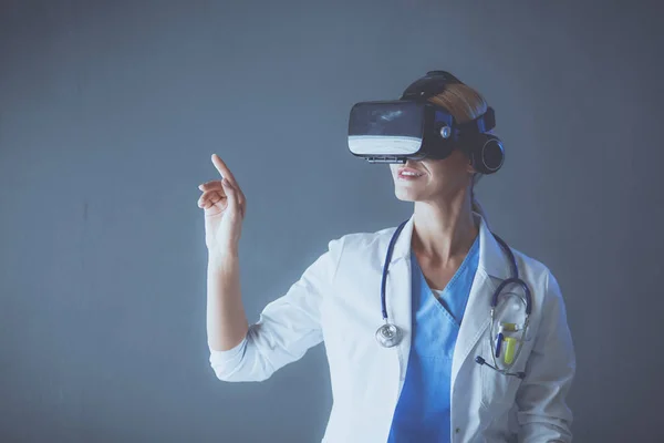 Female doctor wearing virtual reality glasses isolated on white background. — Stock Photo, Image