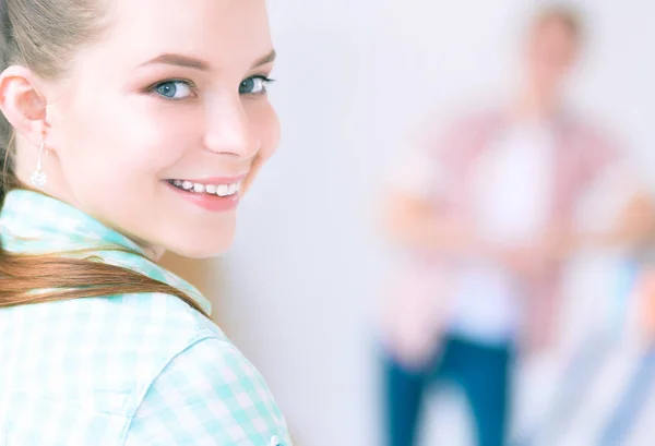 Portrait of young couple moving in new home. Young couple — Stock Photo, Image