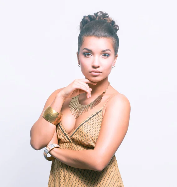 Portrait of young beautiful brunette woman in beads — Stock Photo, Image