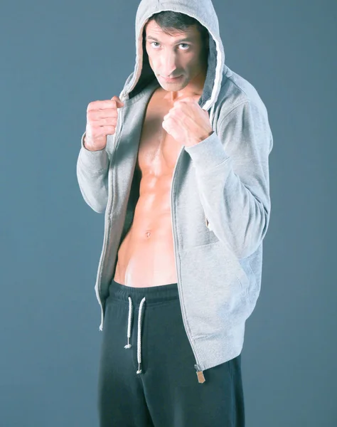 Vista de perfil del joven practicante de boxeo. Instructor personal. Formación personal . —  Fotos de Stock