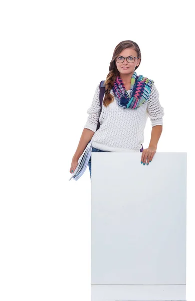 Hermosa estudiante señalando en el tablero en blanco. Estudiante . — Foto de Stock