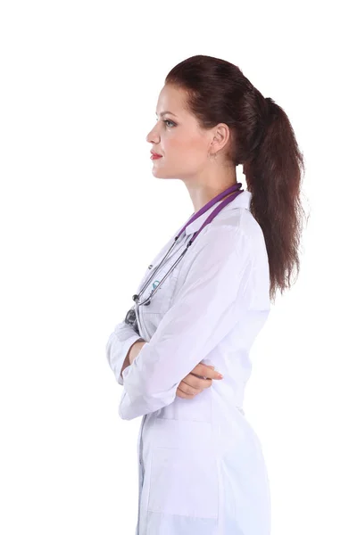 Porträt einer jungen Ärztin mit weißem Mantel, die im Krankenhaus steht. Porträt einer jungen Ärztin — Stockfoto