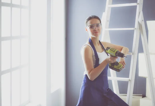 Young woman portrait while standing new apartment . — Stock Photo, Image