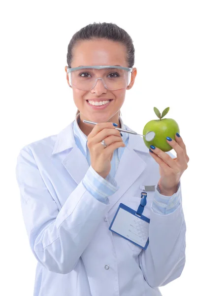 Mosolygó doktornő egy zöld almával. Női orvos — Stock Fotó