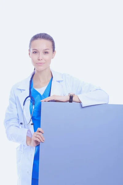 A female doctor with a blank billboard. Woman doctor — Stock Photo, Image