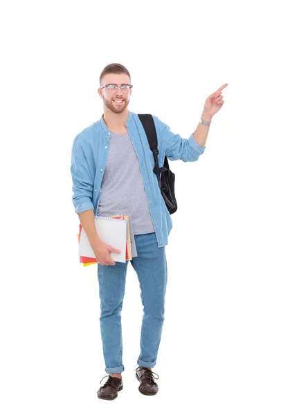Ученик со школьной сумкой, держащий книги на белом фоне. Образовательные возможности. Студент . — стоковое фото