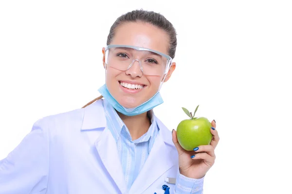 Dentista médico mulher segurar maçã fresca verde na mão e escova de dentes. Médicos dentistas. Mulheres médicas — Fotografia de Stock