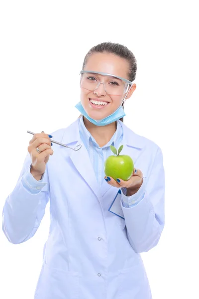 Dentist medical doctor woman hold green fresh apple in hand and tooth brush. Dentist doctors. Woman doctors — Stock Photo, Image