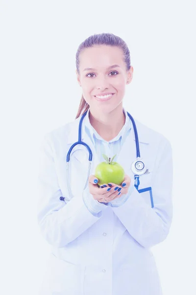 Una doctora sonriente con una manzana verde. Mujer doctora —  Fotos de Stock
