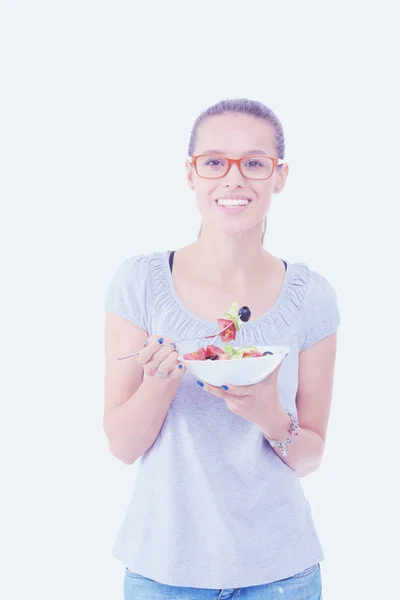 Uma linda garota comendo comida saudável. Menina bonita — Fotografia de Stock