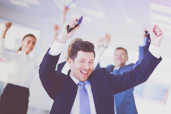 Business team viert een triomf met armen omhoog — Stockfoto