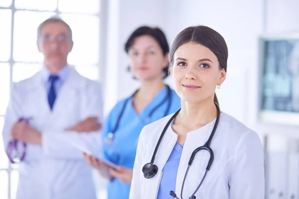 Group of doctors and nurses standing in the hospital Accident and Emergency department — Stock Photo, Image