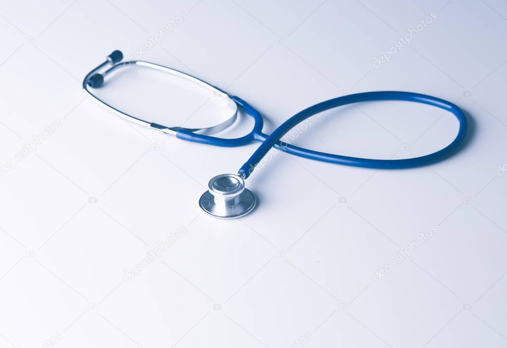 Medical stethoscope or phonendoscope on white background