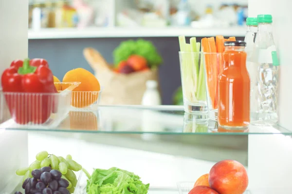 Open refrigerator with fresh fruits and vegetable. Open refrigerator — Stock Photo, Image